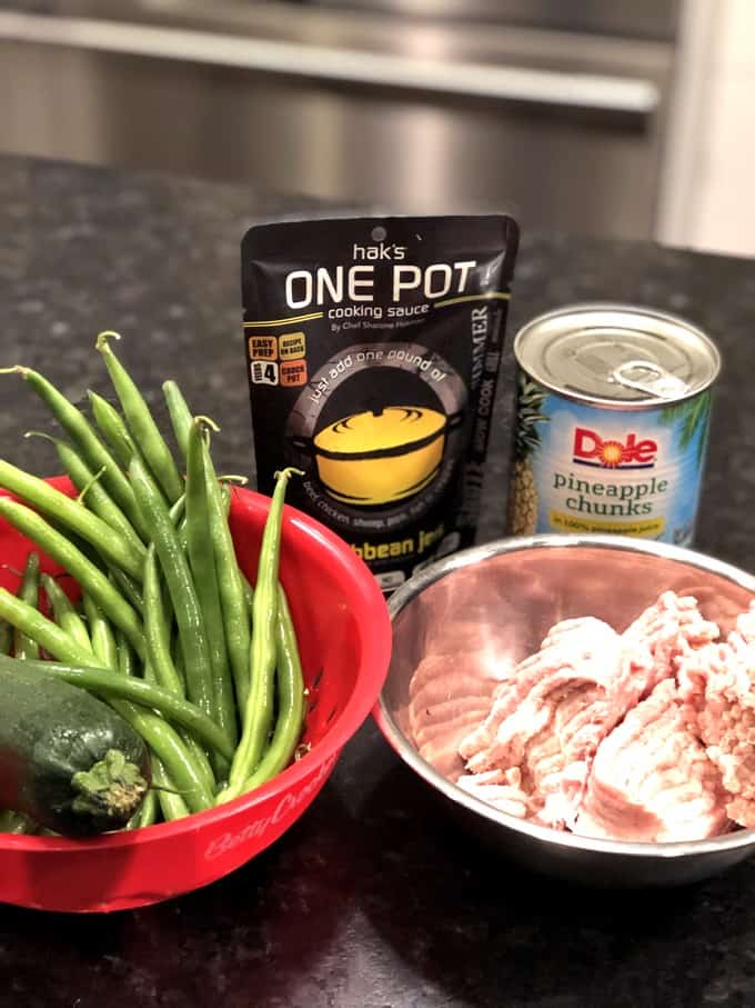Ingredients for making Caribbean Jerk Turkey - ground turkey, zucchini, green beans, pineapple chunks and Hak's One Pot Caribbean Jerk Cooking Sauce