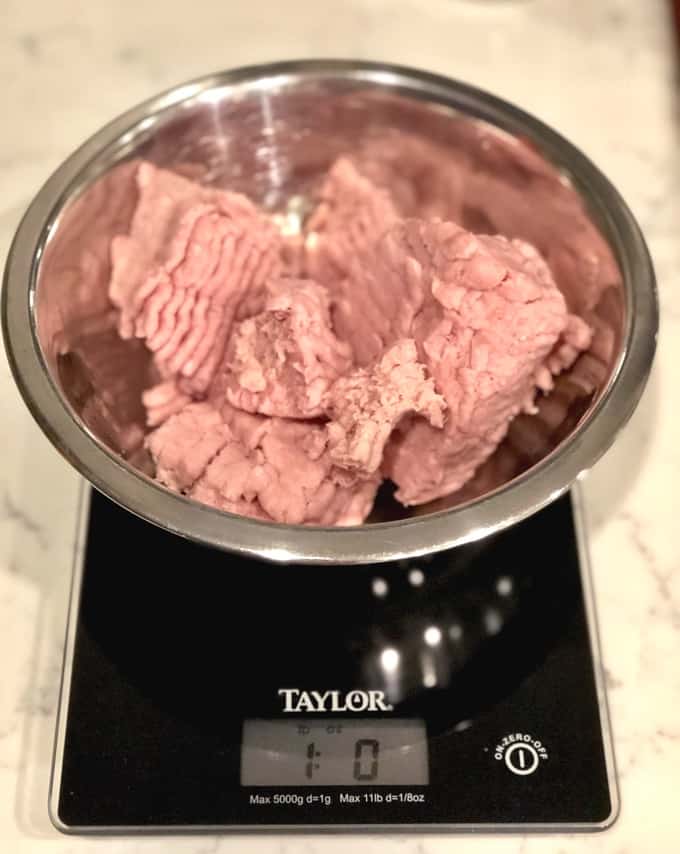 Measuring 1 Pound Ground Turkey in a bowl on a kitchen scale