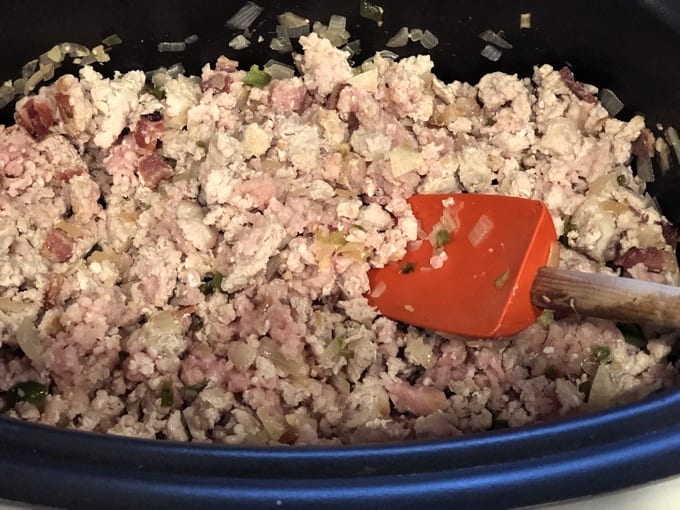 Cooking ground turkey meat until browned for chili