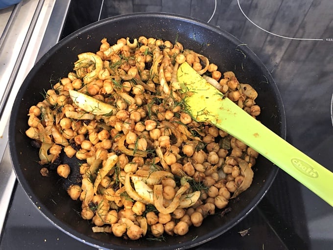 Chickpea skillet with fennel and chopped fennel fronds.