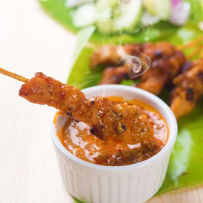 Chicken satay dipped in spicy peanut sauce.