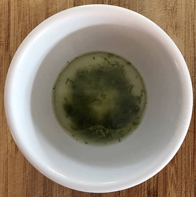 Lime Mint Dressing in small white bowl.