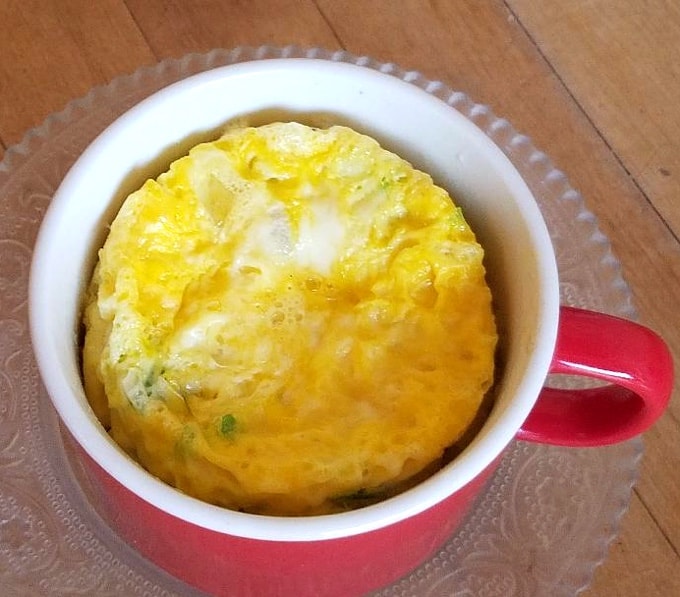Omelette in a red mug.
