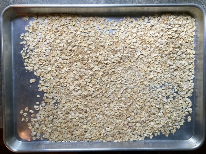 Rolled oats on cookie sheet.