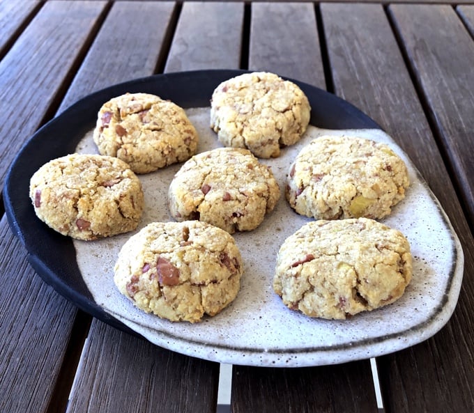 Easy almond apple cookies on ceramic plate on wooden table.