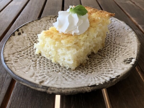 piece of pineapple angel food cake on a pottery plate