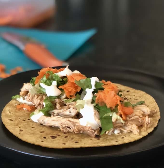 Warm tortilla topped with buffalo chicken, lettuce, carrots and ranch dressing