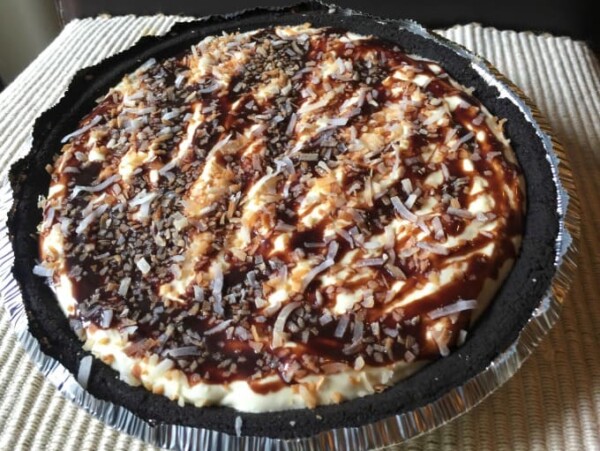 chocolate mounds no bake pie in cookie crust foil plan on beige textured placemat