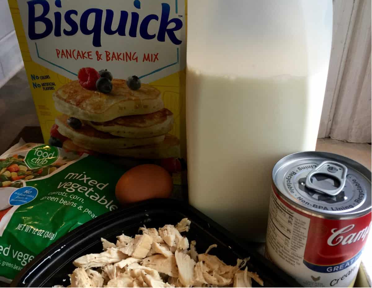 Bisquick baking mix, milk, condensed cream of chicken soup, frozen mixed vegetables and chopped/shredded cooked chicken breast.