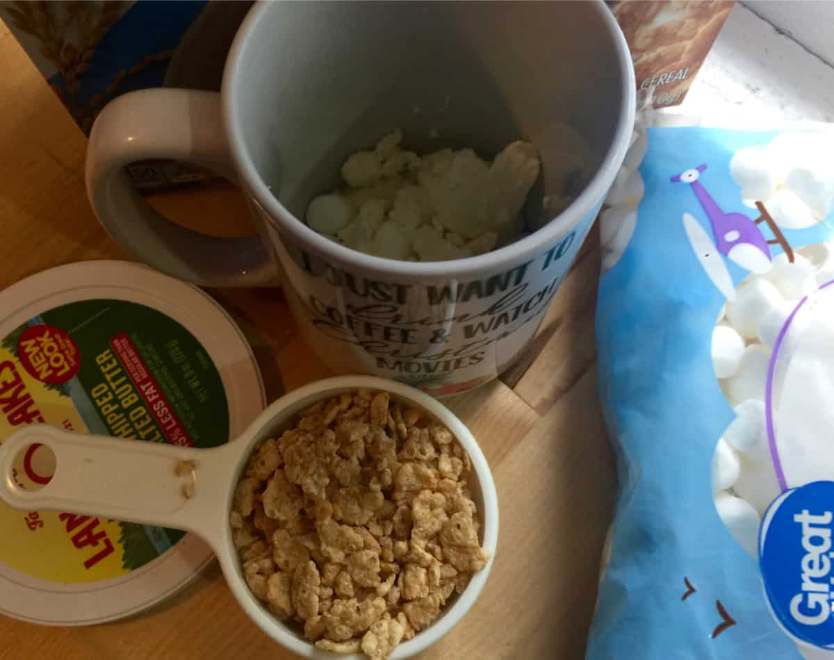 Making microwave rice crispy treat in a mug.
