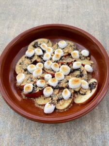 terra cotta plate with apple s'mores nachos