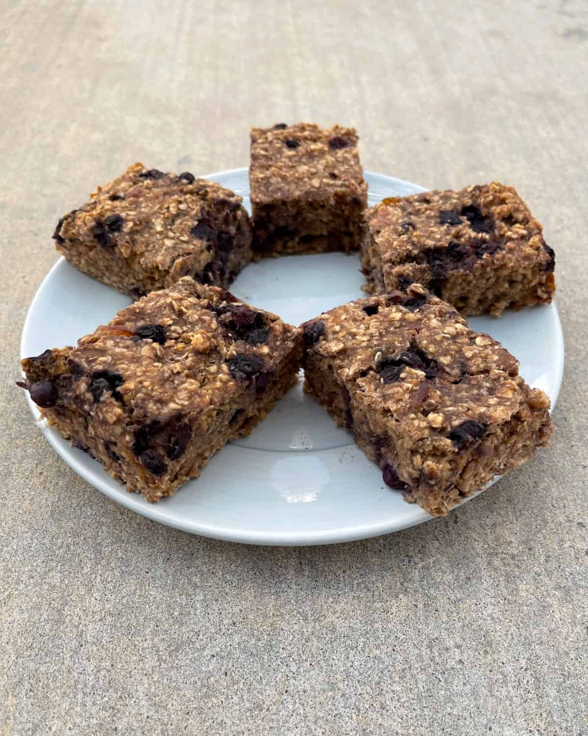Blueberry banana oat squares on small blue plate.