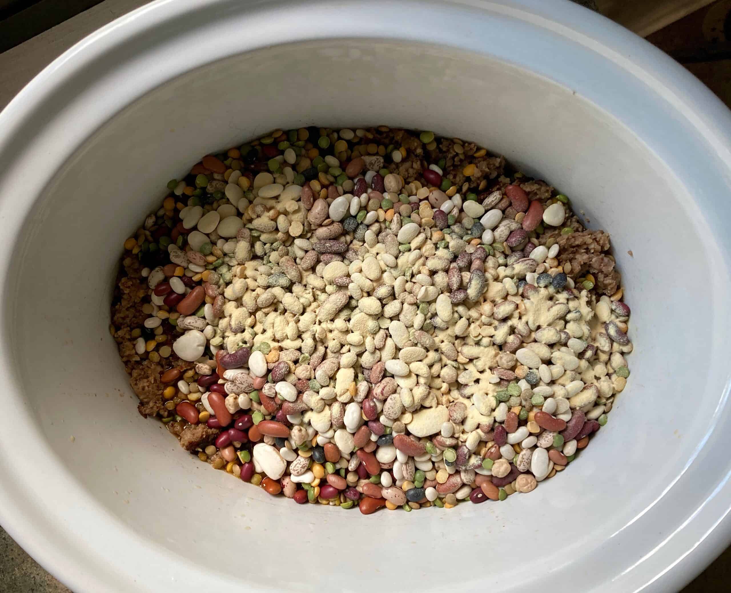 Dry bean soup mix in crock pot from overhead.