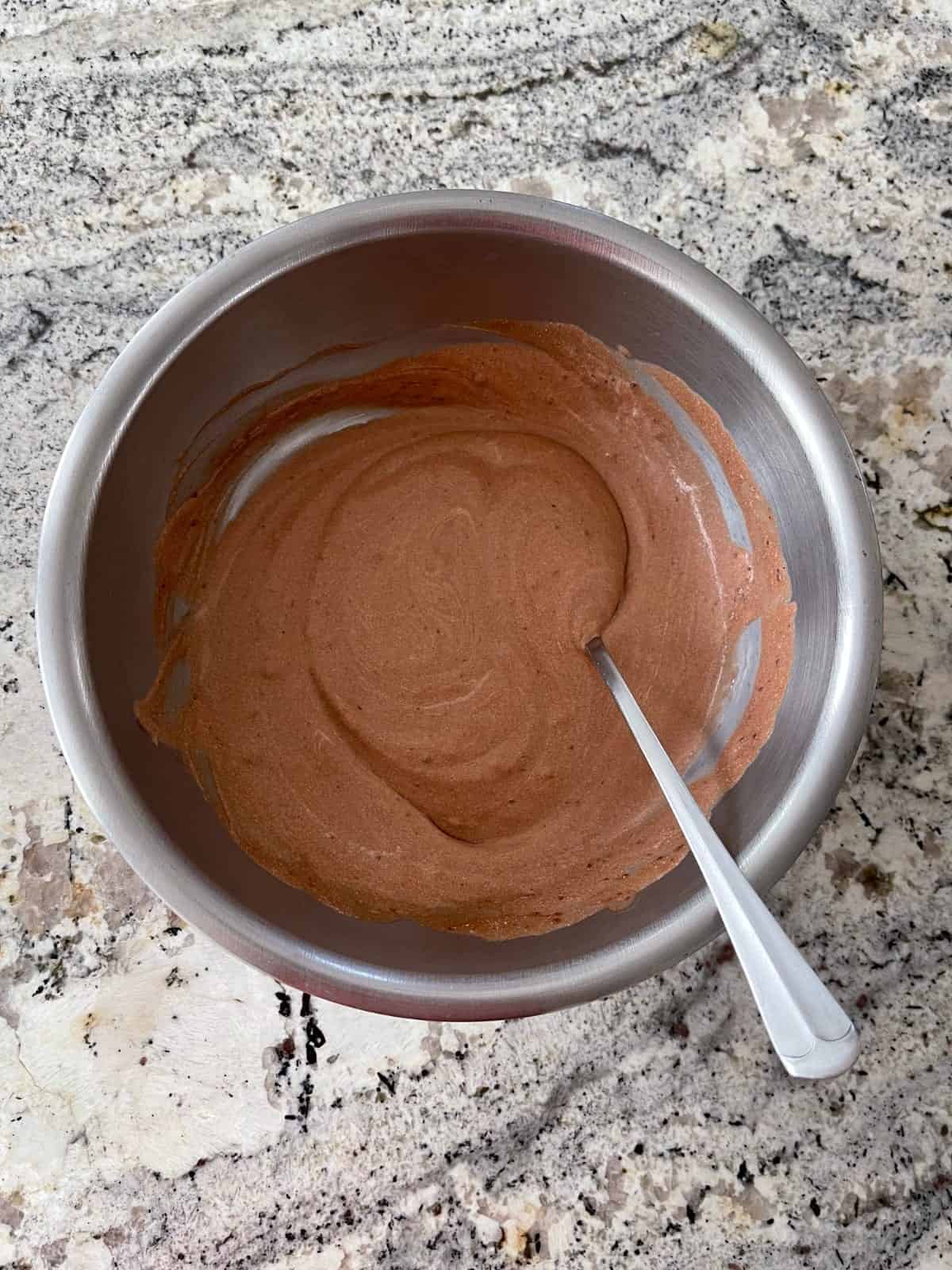 Stirring Truwhip whipped topping into instant chocolate pudding mix.