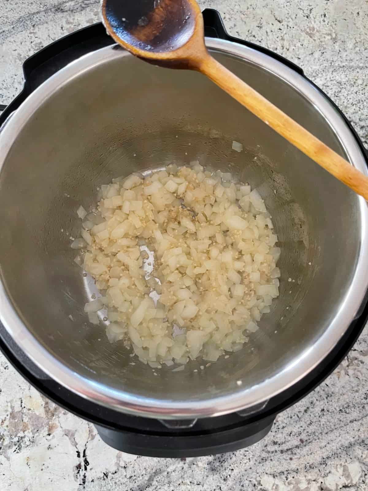 Sauteeing onions and garlic in instant pot.