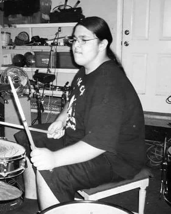 Dylan playing drums before losing weight.