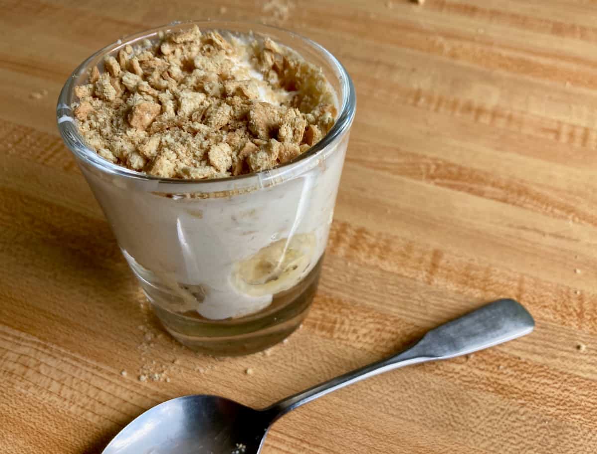 Yogurt banana pudding cup topped with crushed graham crackers.
