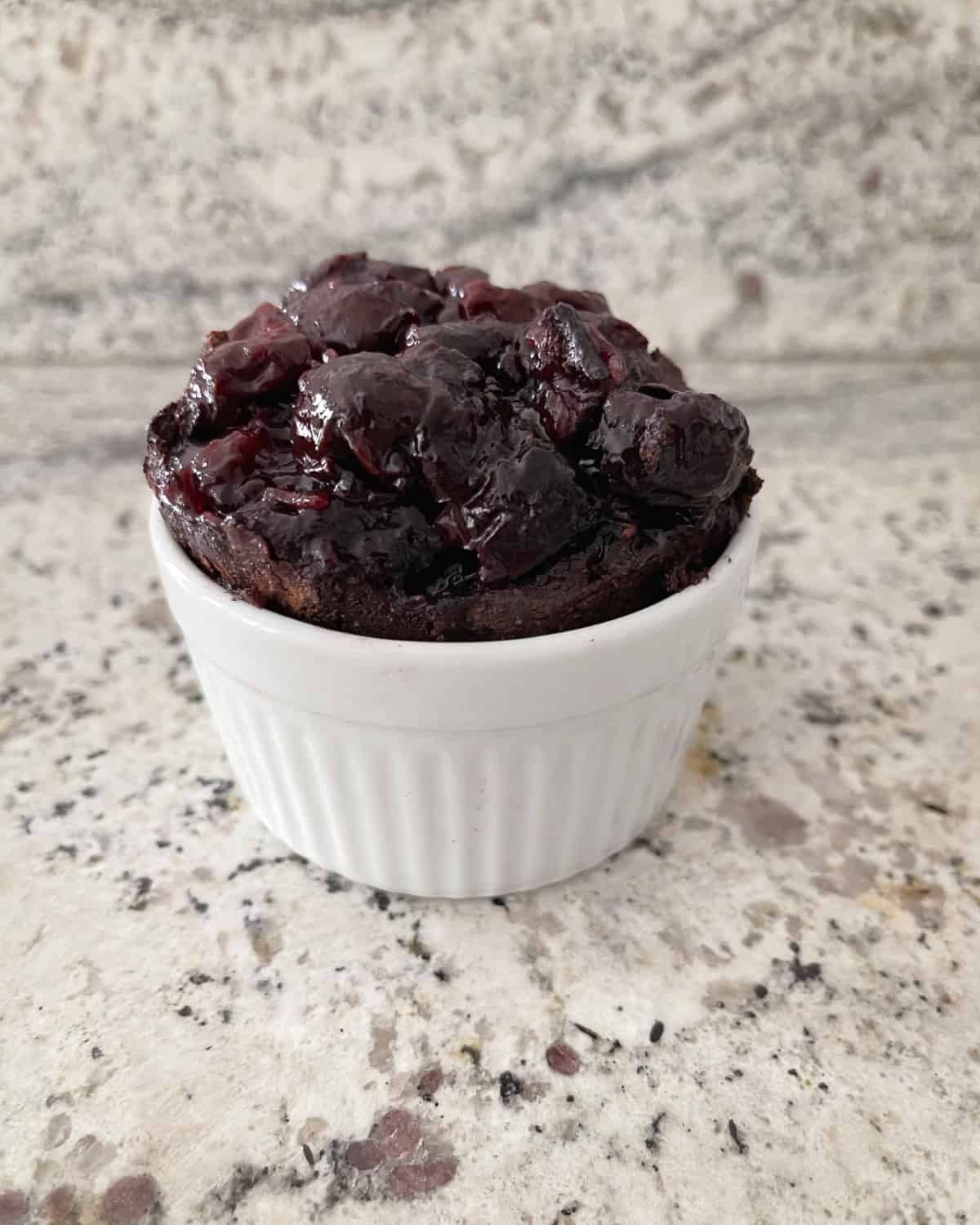 Microwave Black Forest Chocolate Cake for one in white ramekin.