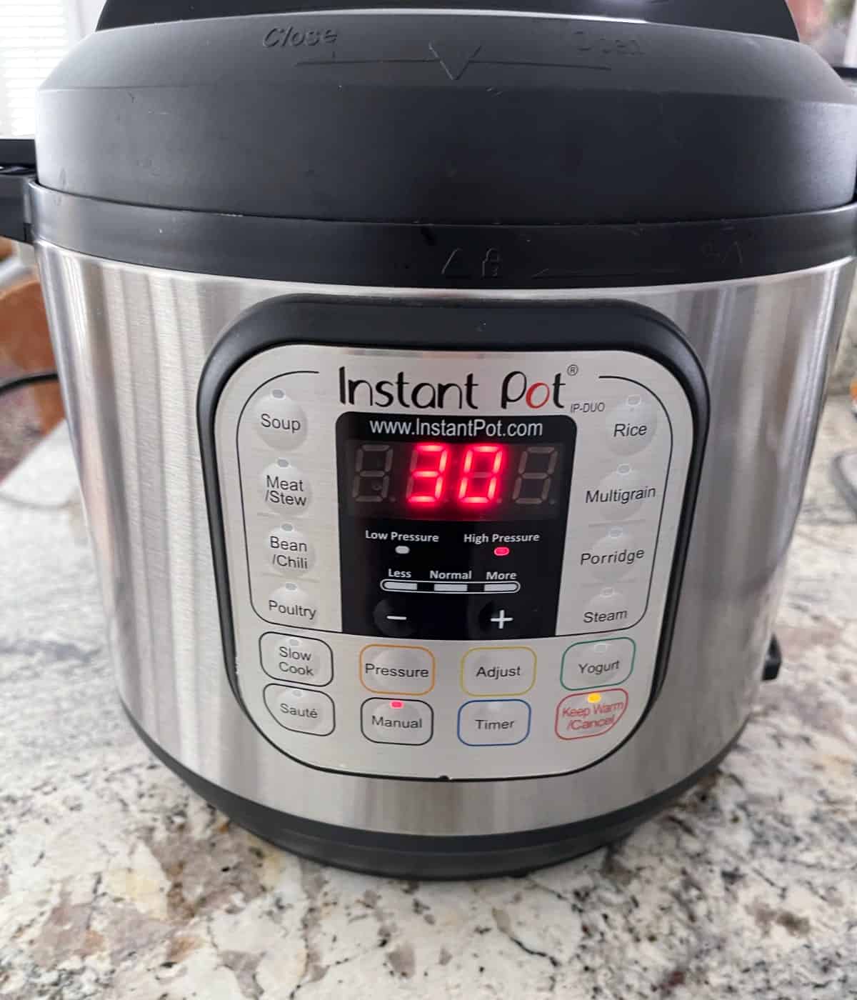 Covered Instant Pot set for 30 minutes on HIGH pressure.