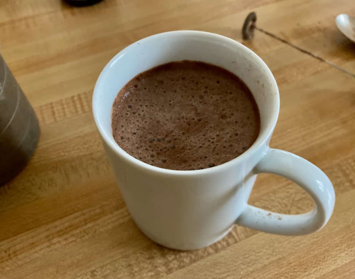 hot chocolate in white ceramic mug