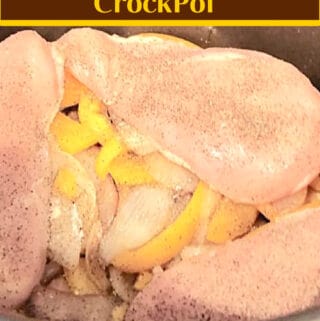 raw chicken & onions in crock pot with text: "The Ultimate Guide to Cooking Chicken in the CrockPot"