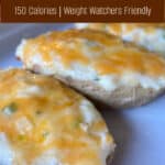 Twice Baked Potatoes in White Baking Dish with Title Text for Pinterest Pin