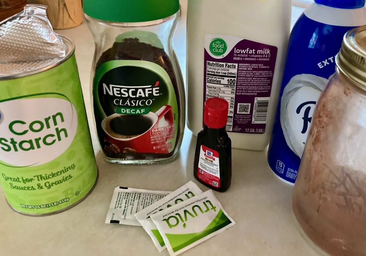 Ingredients including corn starch, low fat milk, cocoa powder, truvia packets, peppermint extract, cocoa powder and whipped cream.
