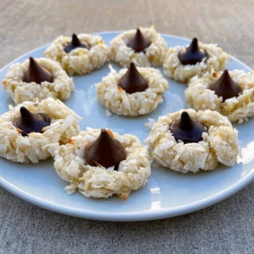 https://simple-nourished-living.com/wp-content/uploads/2022/12/coconut-macaroon-kiss-cookies-blue-plate-500x500.jpg