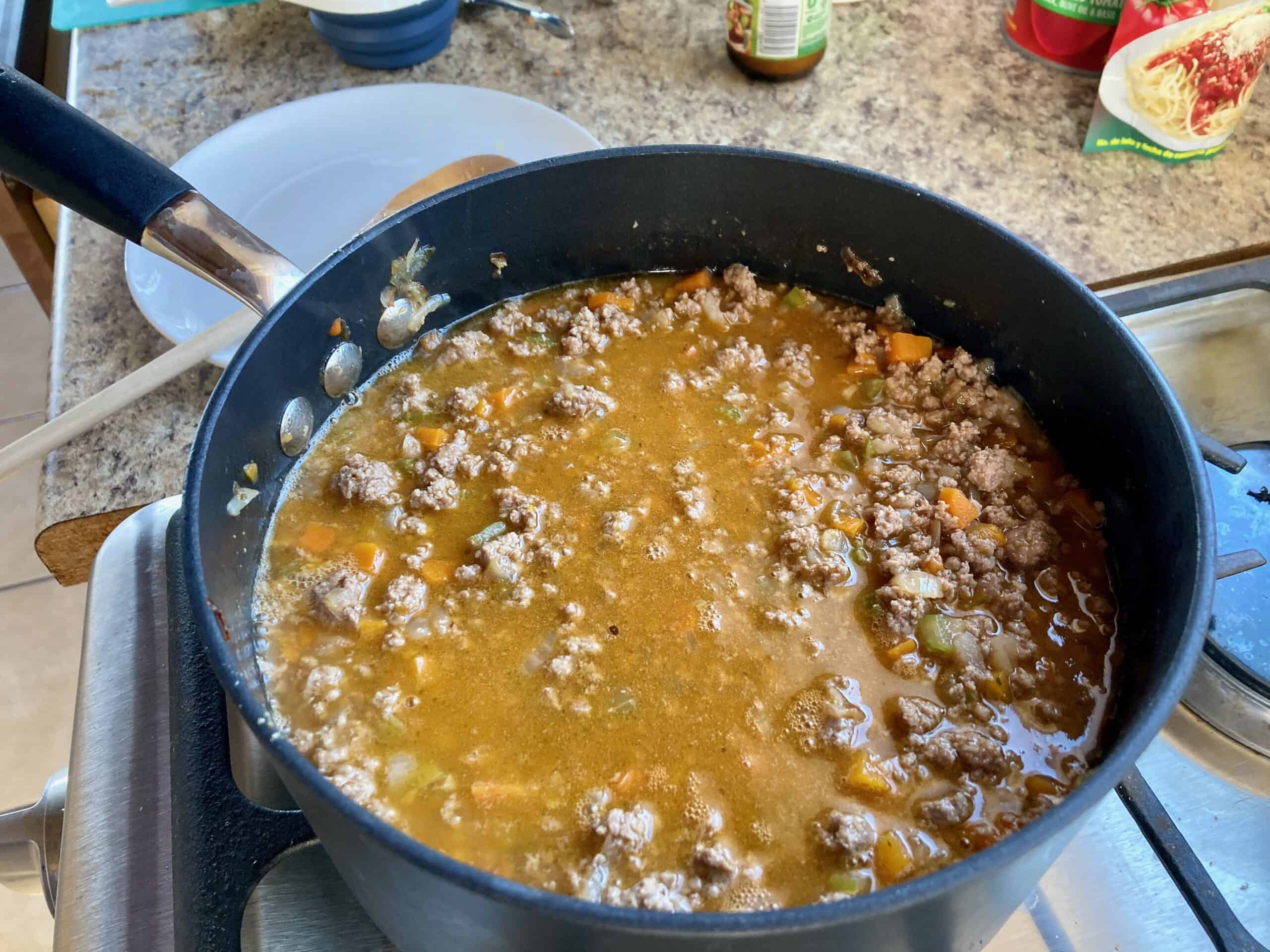 Turkey Bolognese sauce in a large pot on the stove.