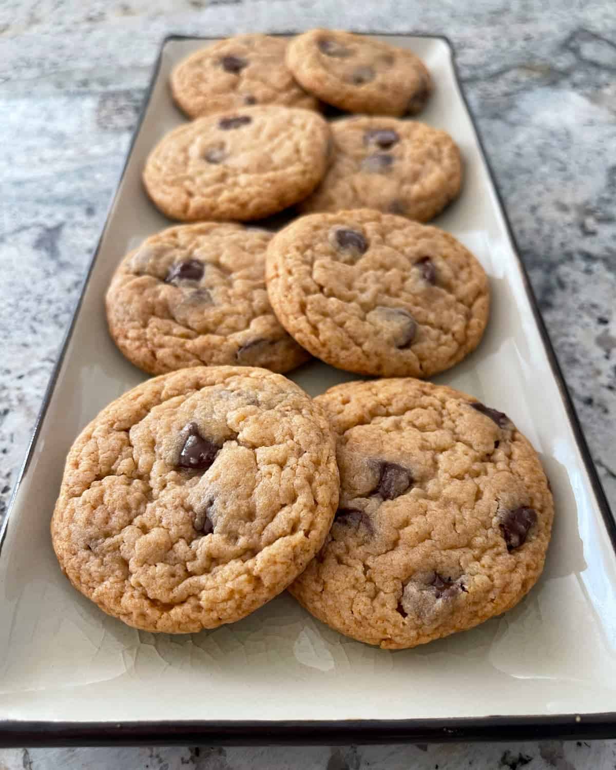 Halo Top light peanut butter chocolate chip cookies on rectangular serving plate.