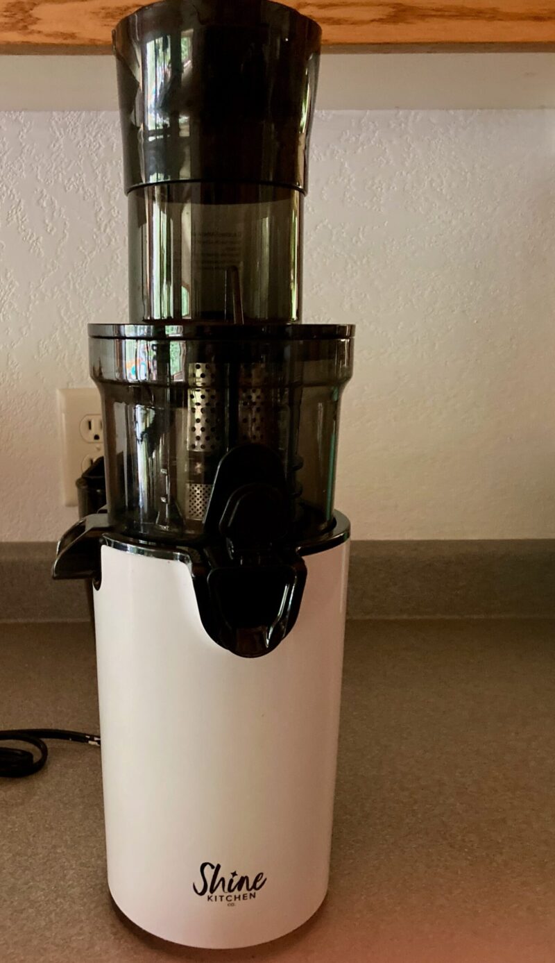 Fully Assembled Tribest Shine Juicer on Counter.