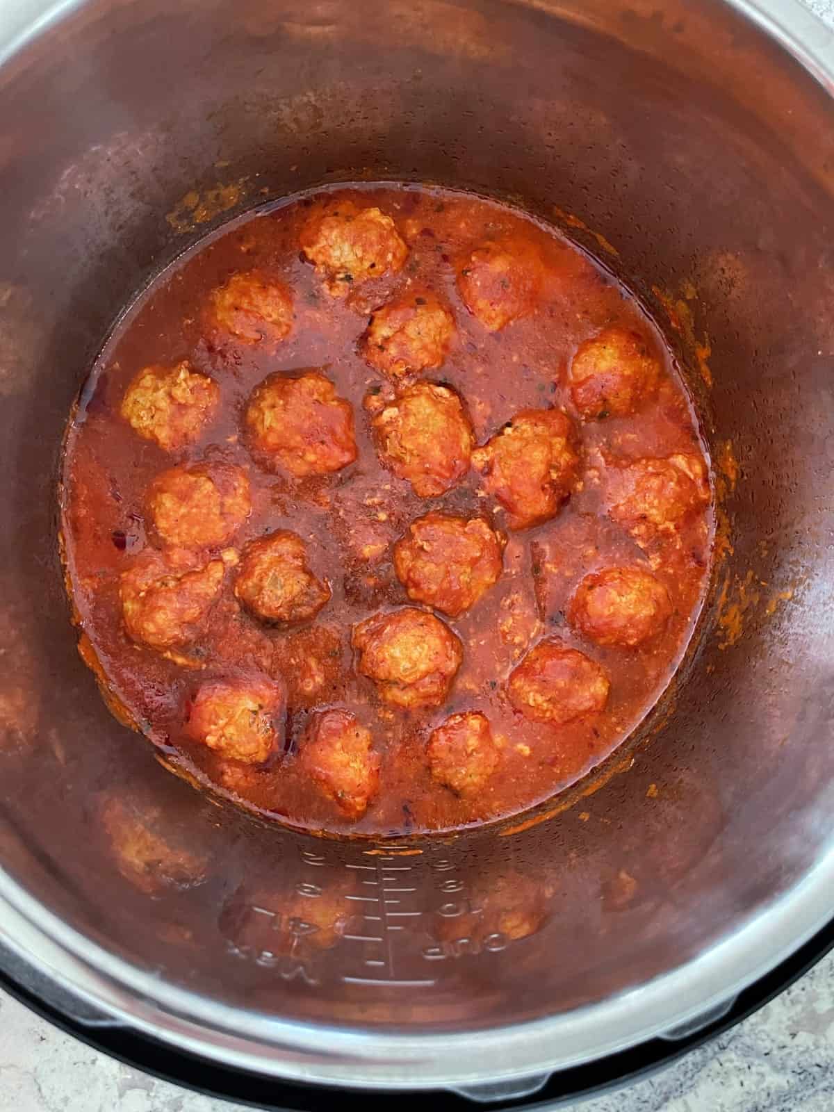 Fresh cooked Italian turkey meatballs in marinara in Instant Pot.