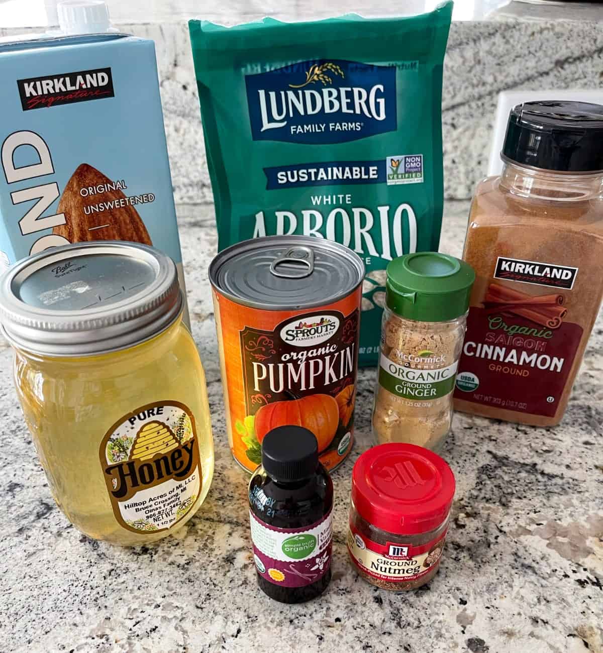 Ingredients including unsweetened almond milk, arborio rice, honey, canned pumpkin, vanilla extract, cinnamon, ground ginger and ground nutmeg.