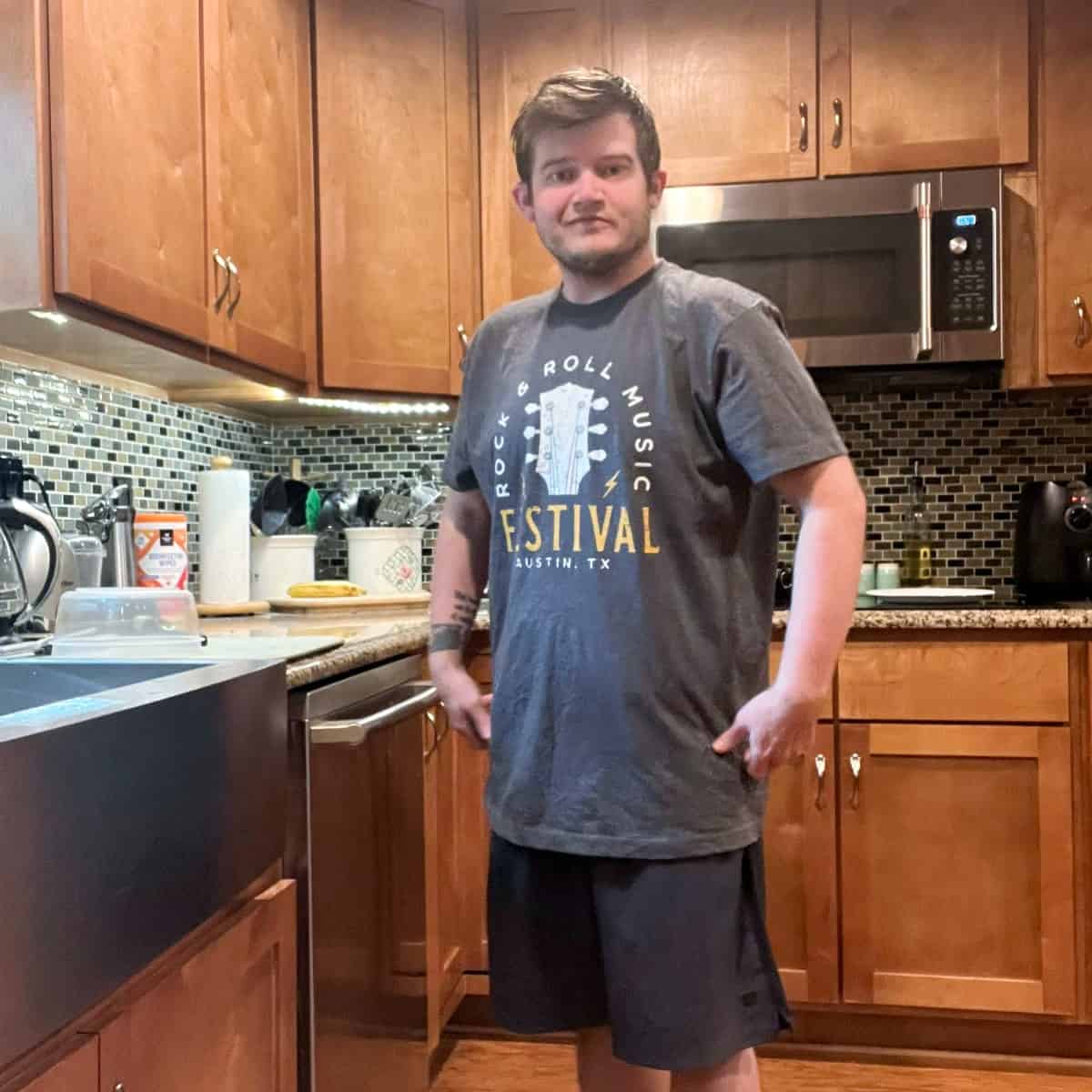 Matthew in kitchen after 67 pound weight loss.