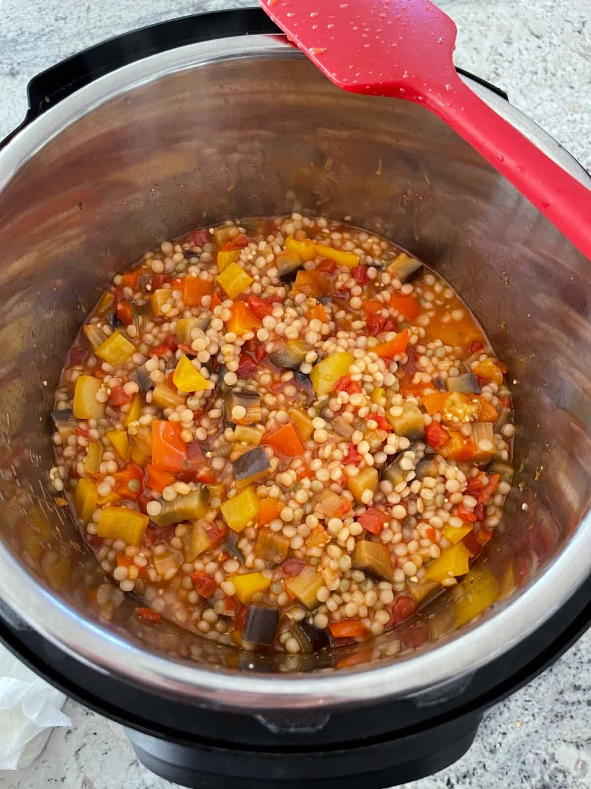Fresh cooked InstantPot Israeli couscous puttanesca stew.