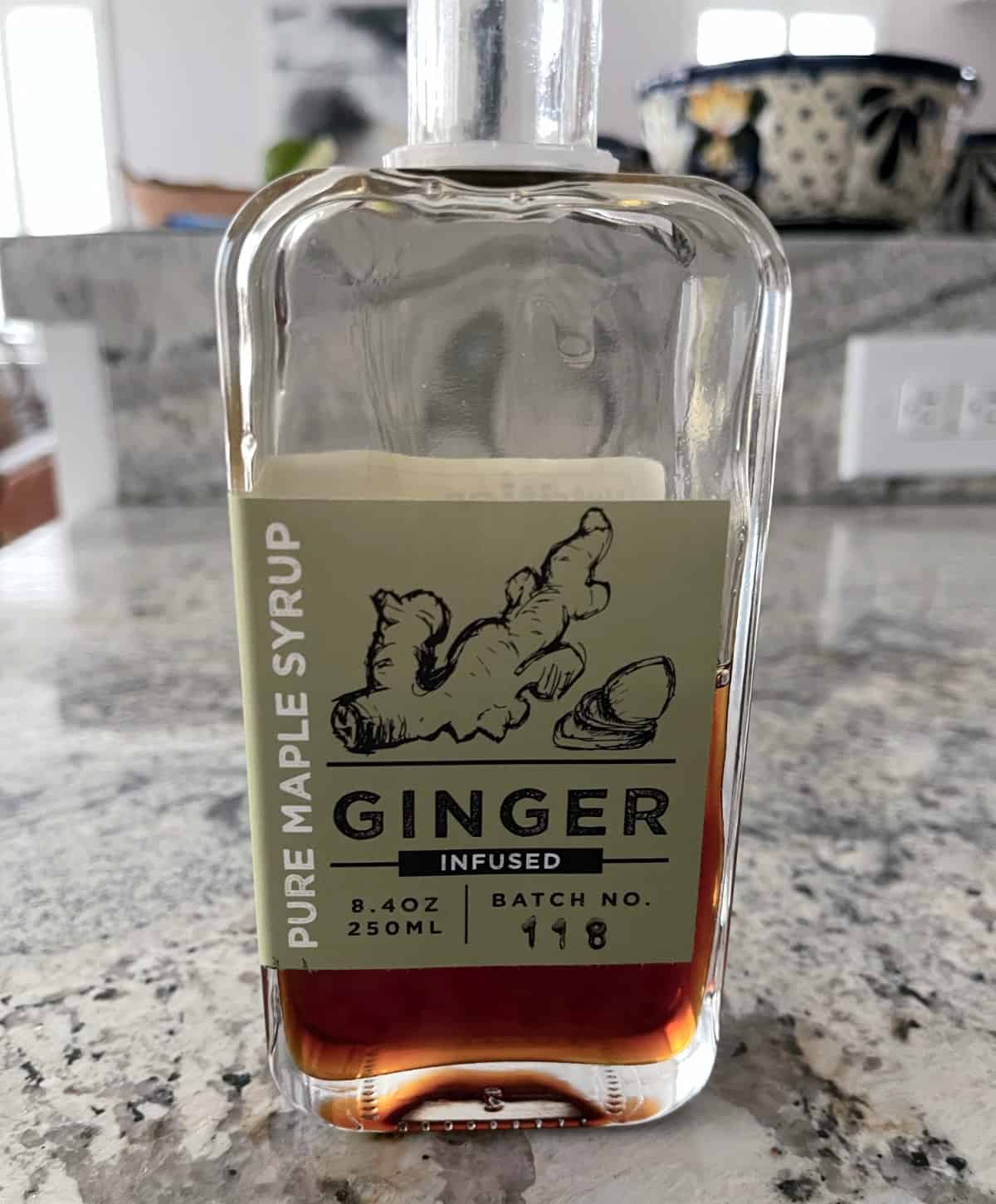 Bottle of ginger infused pure maple syrup.