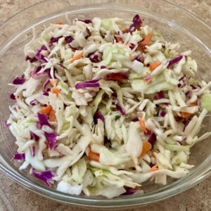 Skinny 2-Ingredient Coleslaw in glass bowl