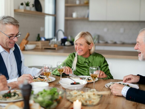Older folks enjoying dinner