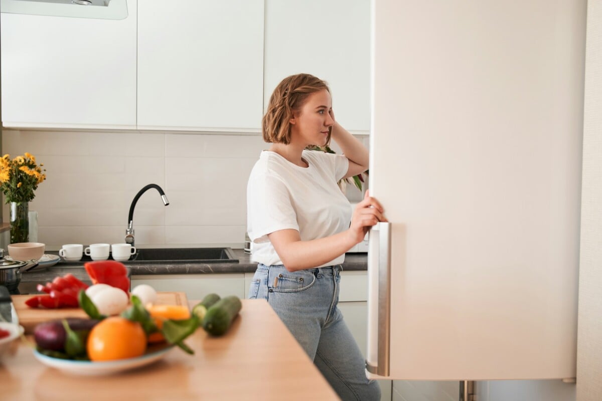 Woman looking into the refrigerator.