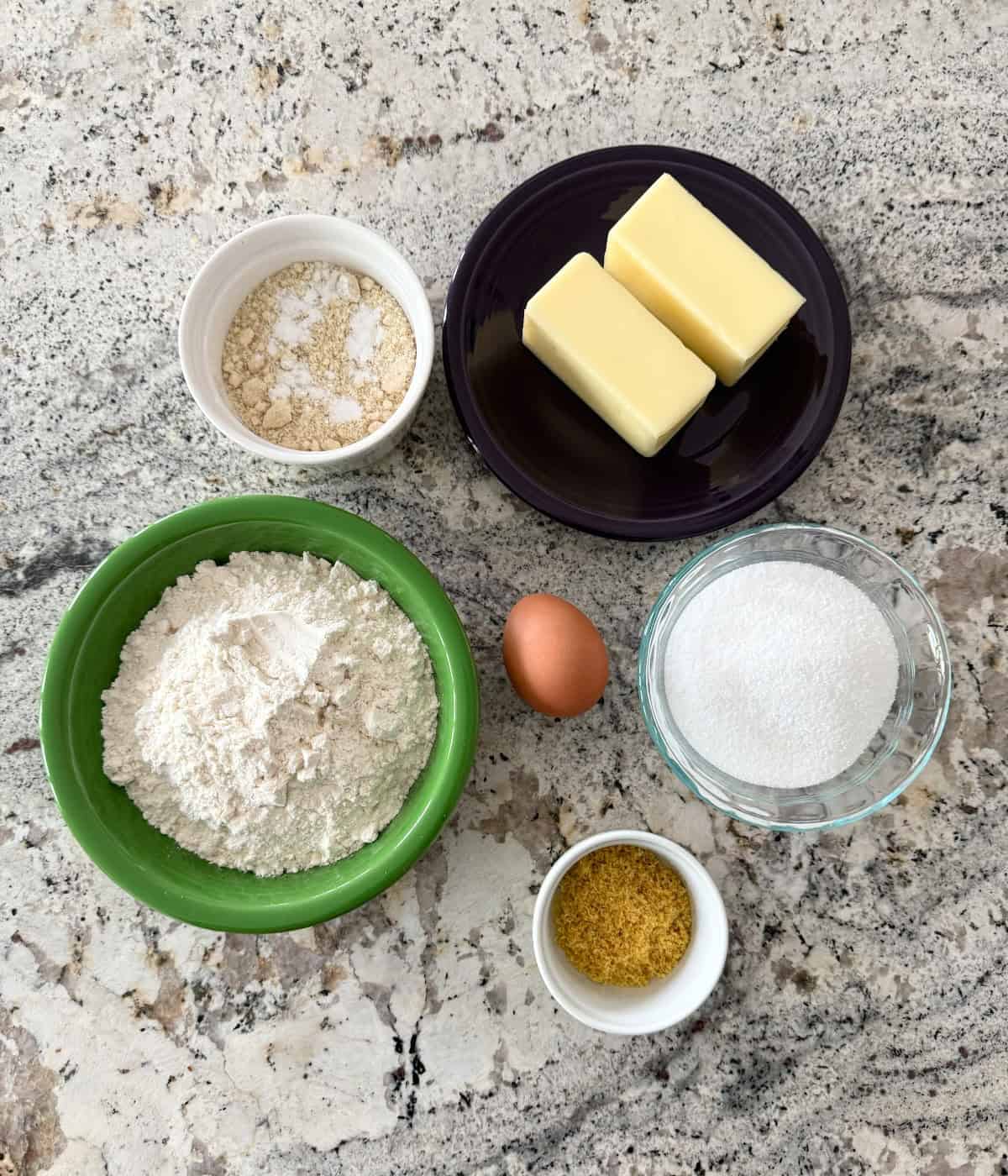 Shortbread cookie ingredients including butter, all-purpose flour, almond flour, egg, no-calorie sweetener and lemon zest.