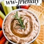 bowl of creamy white bean dip surrounded by vegetables and crackers with text overlay for Pinterest PIN