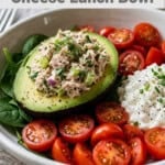 high protein cottage cheese lunch bowl with tuna and avocado with text overlay for pinterest pin