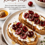 two slices of cherry ricotta toast on white plate for Pinterest PIN